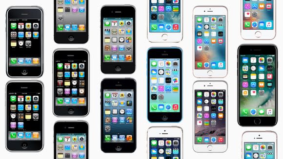 Many Apple iPhones, lying flat.