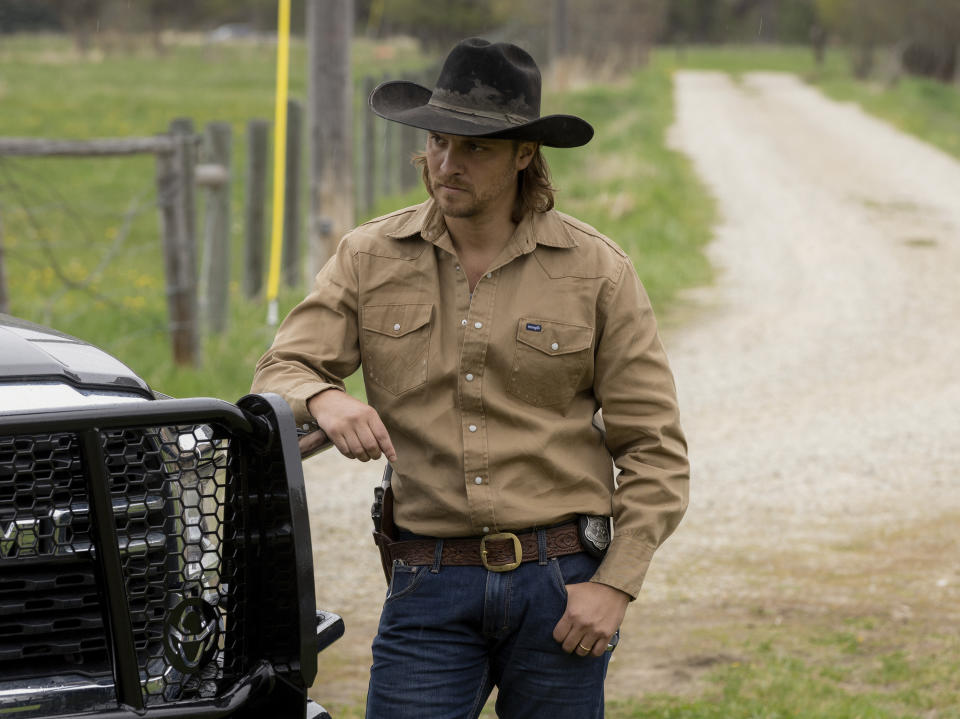 This image released by Paramount Network shows Luke Grimes in a scene from "Yellowstone." Grimes, best-known for his portrayal of the complex cowboy character Kayce Dutton on the hit show “Yellowstone,” will release his self-titled debut album on Friday. (Paramount Network via AP)