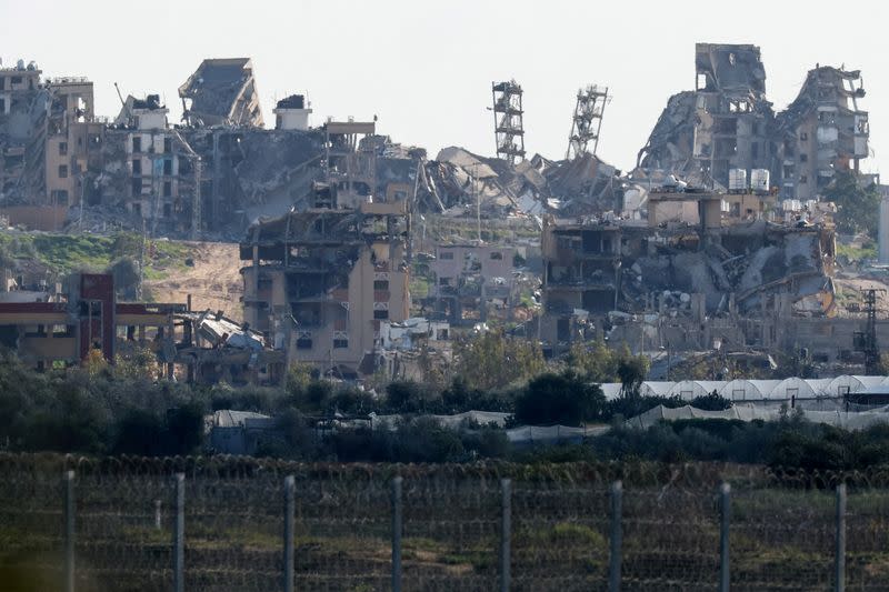 Damaged houses lie in ruin in northern Gaza