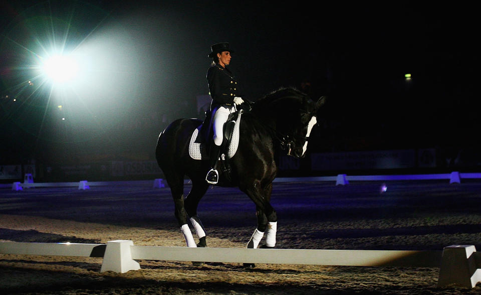 BIRMINGHAM, UNITED KINGDOM - OCTOBER 10:  Katie Price and her horse 'Jordans Glamour Girl' perform Dressage to Music during the Horse of the Year Show at the NEC on October 10, 2008 in Birmingham, England.  (Photo by Matthew Lewis/Getty Images)