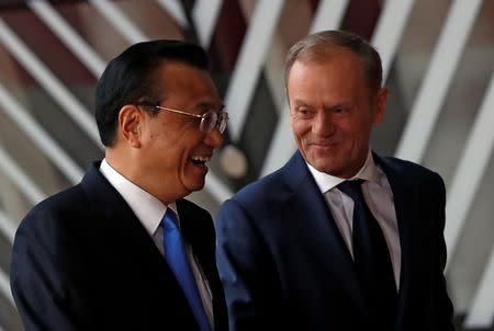 Chinese Premier Li Keqiang and European Council President Donald Tusk arrive ahead of a EU-China summit in Brussels, Belgium April 9, 2019. REUTERS/Susana Vera