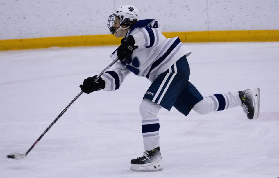 Pittsford's Keegan Garver takes a shot.