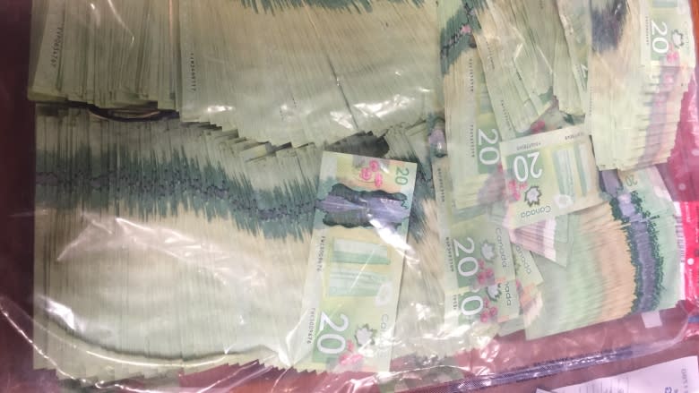 Toronto police charge 4 after guns, drugs and cash seized on weekend