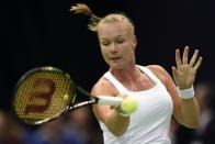 Netherlands' Kiki Bertens returns to Russia's Yekaterina Makarova during the Federation Cup tennis world group 1st round match between Russia and Netherlands in Moscow on Ferbuary 6, 2016