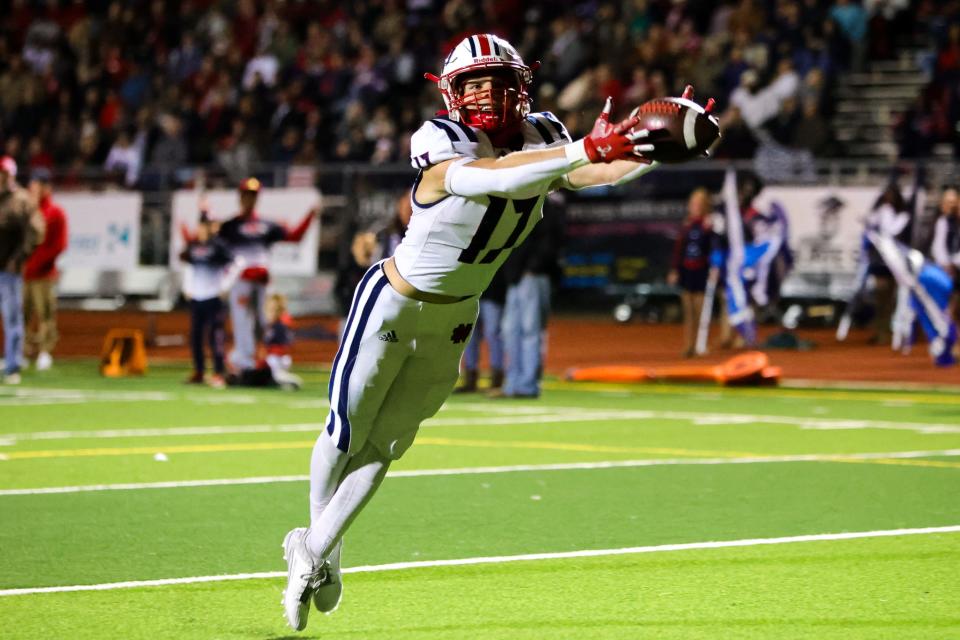 North Desoto’s Laundry Wyatt making a diving touchdown catch in the 4A District Championship game vs Northwood on November 2, 2023