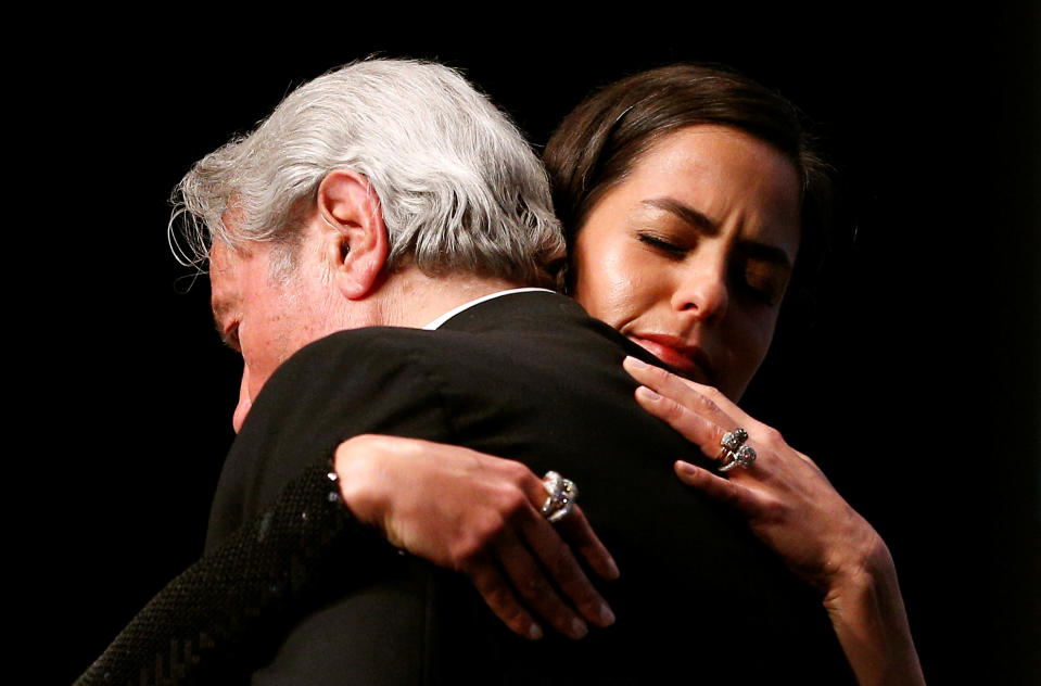 72nd Cannes Film Festival - Honorary Palme d’Or - Cannes, France, May 19, 2019. Actor Alain Delon is embraced by his daughter Anouchka Delon as he receives his honorary Palme d'Or Award. REUTERS/Stephane Mahe     TPX IMAGES OF THE DAY