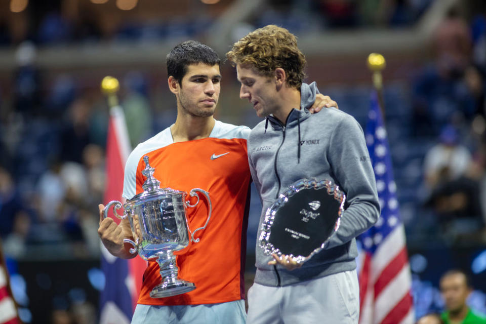 Winner Carlos Alcaraz of Spain and runner-up Casper Ruud of Norway with their trophies after the Men's Singles Final match at the USTA National Tennis Center on Sept. 11th 2022 in Flushing, Queens, New York City.<span class="copyright">Tim Clayton/Corbis via Getty Images</span>