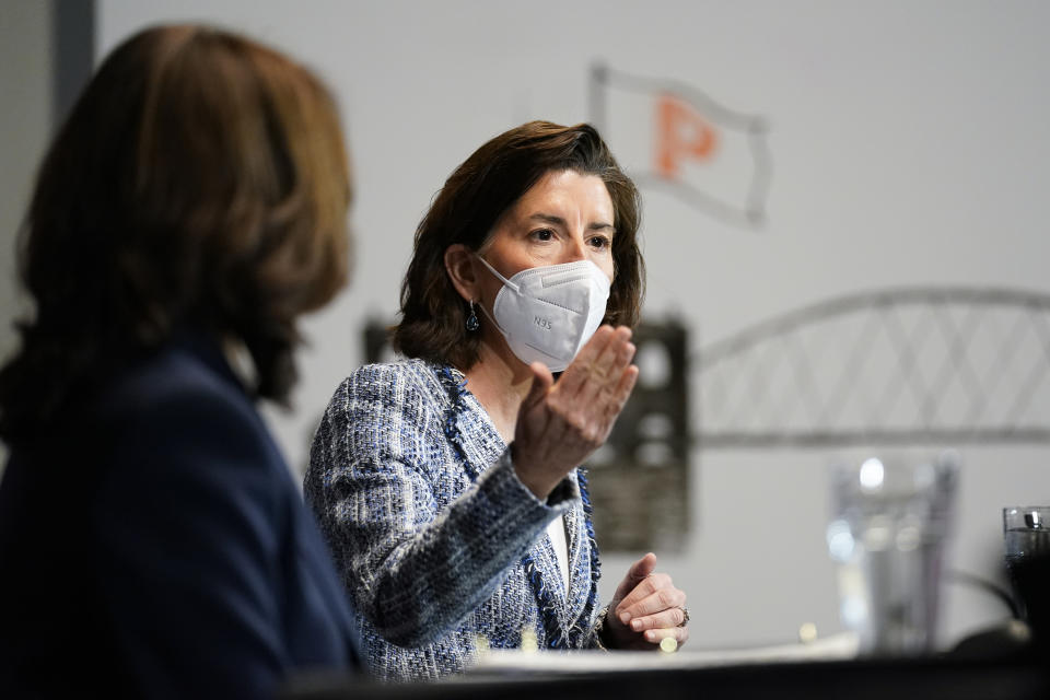 FILE - In this May 5, 2021, file photo Vice President Kamala Harris, left, and Secretary of Commerce Secretary Gina Raimondo participate in a roundtable with women-led small business owners in Providence, R.I. (AP Photo/Andrew Harnik, File)