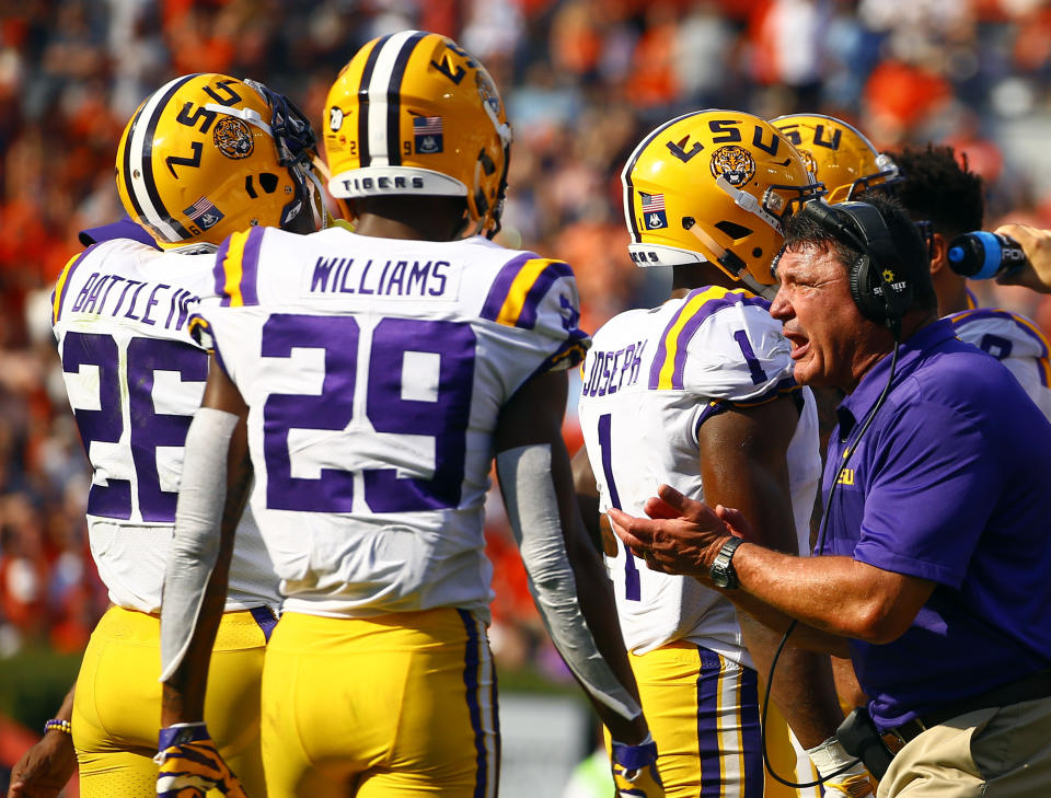LSU head coach Ed Orgeron cheers on his players during the first half of an NCAA college football game against Auburn, Saturday, Sept. 15, 2018, in Auburn, Ala. (AP Photo/Butch Dill)