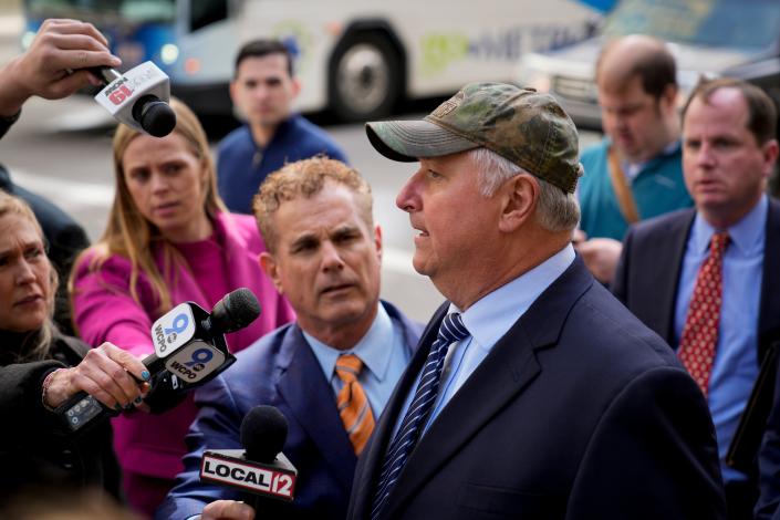 Former Ohio House Speaker Larry Householder is surrounded by reporters outside the Potter Stewart U.S. Courthouse in downtown Cincinnati on Thursday, March 9, 2023, after a jury found him and former Ohio Republican Party chairman Matt Borges guilty of racketeering conspiracy.