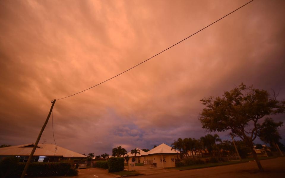 Storm clouds gather in the town of Ayr in far north Queensland  - AFP