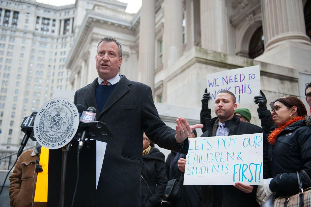 Public Advocate Bill de Blasio holds a press conference on February 12, 2012 outside of Tweed Courthouse calling on the Teacher's Union and Mayor Michael Bloomberg to reach a deal on teacher evaluations.