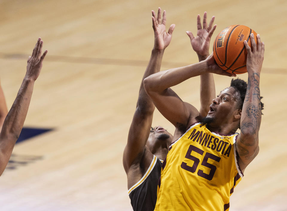 Minnesota's Ta'lon Cooper shoots against Western Michigan during the second half of an NCAA college basketball game Monday, Nov. 7, 2022, in Minneapolis. (Carlos Gonzalez/Star Tribune via AP)