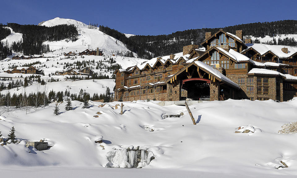 FILE-This undated file photo shows the Yellowstone Club near Big Sky, Mont. Five former workers are suing the club and a hospitality staffing agency alleging they and more than 100 other workers recruited from Jamaica were discriminated against and paid less than non-Jamaican workers doing the same job. The club and the employees declined to comment ahead of Wednesday's mediation session in Missoula. The exclusive ski resort counts Bill Gates, Justin Timberlake and Tom Brady as members. (Erik Petersen/Bozeman Daily Chronicle via AP)