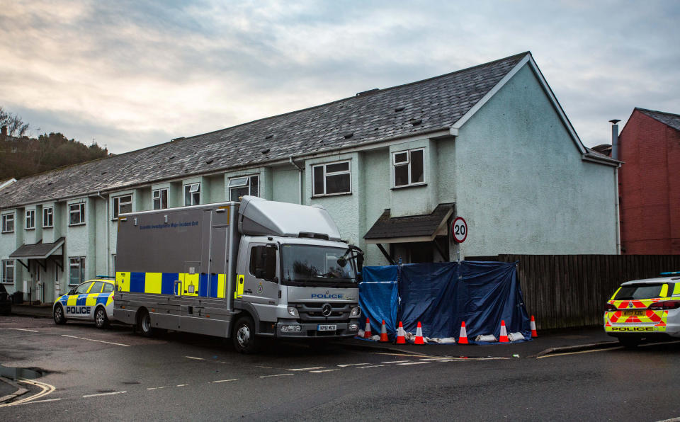 Police remain on the scene following a fire in Clayton Road, Exeter, which claimed the lives of three people. 22nd February 2021.  A four-year-old girl and a couple have died in a house fire, police have said.  See SWNS story SWBRfire.  The girl, a man, 29, and a woman, 28, died following the fire in Clayton Road, Exeter.  Three other children who were in the house, two boys aged four and nine and a seven-year-old girl, are in a stable condition in hospital said officers.  Police called it a 