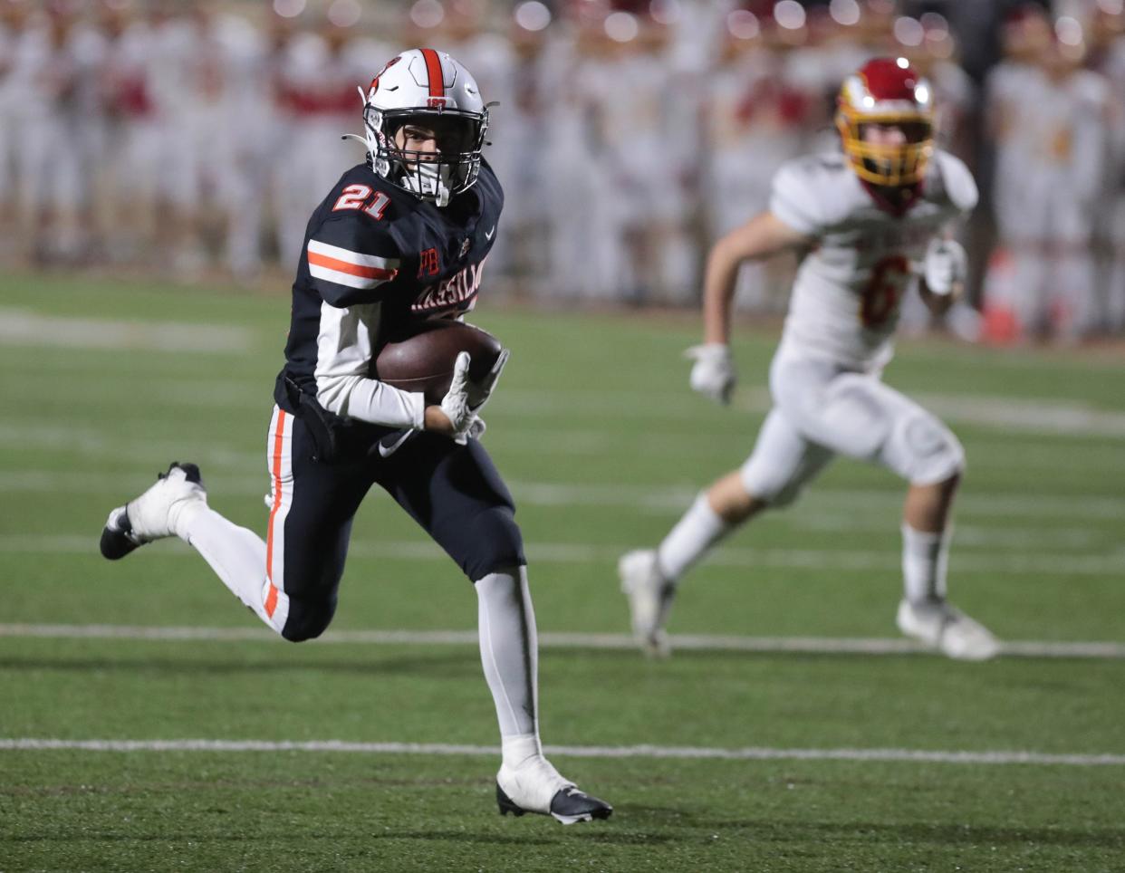 Massillon's Braylyn Toles scores a touchdown against Big Walnut after making a catch at Mansfield's Arlin Field in a Division II playoff game Friday, Nov. 11, 2022.