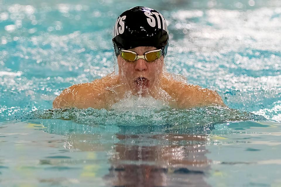 Galesburg freshman Carson Olson competes in the 100 yard breaststroke in a WB6 Conference dual meet against Rock Island on Tuesday, Jan. 25, 2022 at Mustain Pool. Olson took second in the event in 1:11.29.