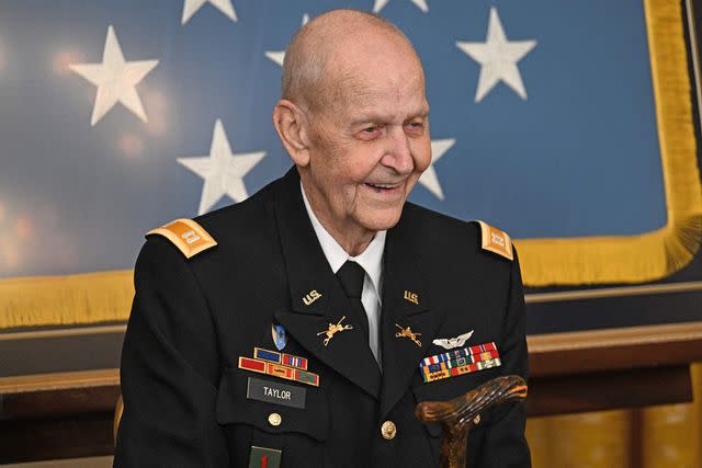 <p>JIM WATSON/AFP via Getty</p> Former US Army Captain Larry Taylor receives the Medal of Honor from President Joe Biden at the White House on Sept. 5