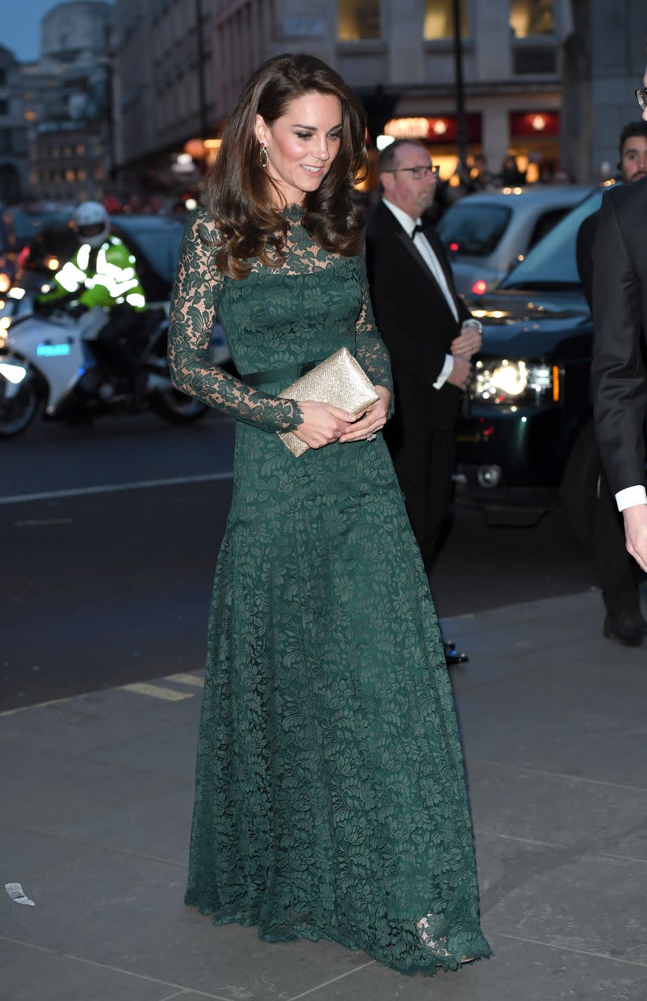 <p>Arriving at the National Portrait Gallery's 2017 Portrait Gala, one of the most anticipated events of the year, Duchess Kate chose a pine green, floor-length gown by Temperley London. She paired her slim-fitting, lace dress with a gold clutch from Wilbur & Gussie and gold heels by Jimmy Choo.</p>