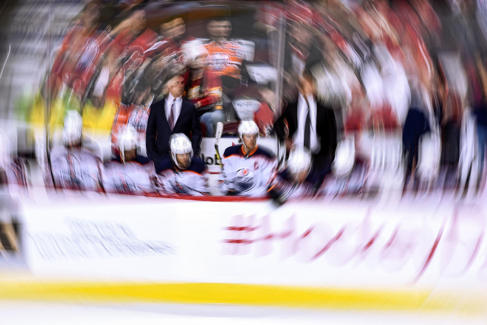 CALGARY, AB - FEBRUARY 01: Edmonton Oilers Center Connor McDavid (97) looks on from the bench during the third period of an NHL game where the Calgary Flames hosted the Edmonton Oilers on February 1, 2020, at the Scotiabank Saddledome in Calgary, AB. (Photo by Brett Holmes/Icon Sportswire via Getty Images)