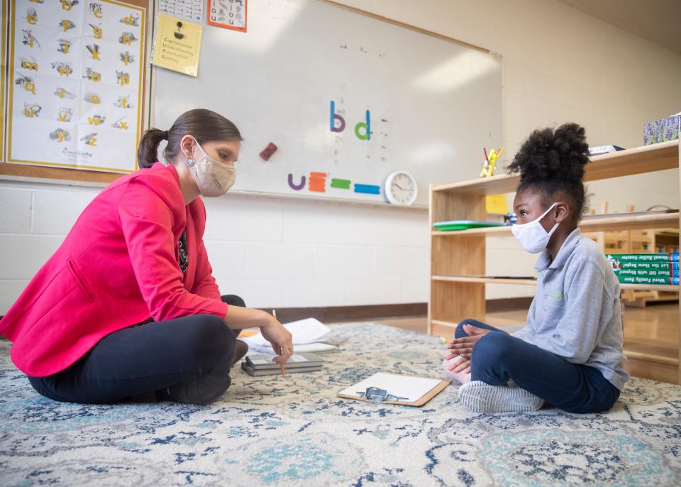 Emily Wakabi  with her student Peytan Tate during a in-person learning session at Libertas School of Memphis on Thursday, March 18, 2021.