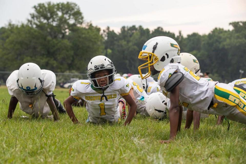 The Greenview Eagles do push ups during a practice at the former W.G. Sanders Middle School in Columbia, South Carolina on Thursday, July 7, 2022.