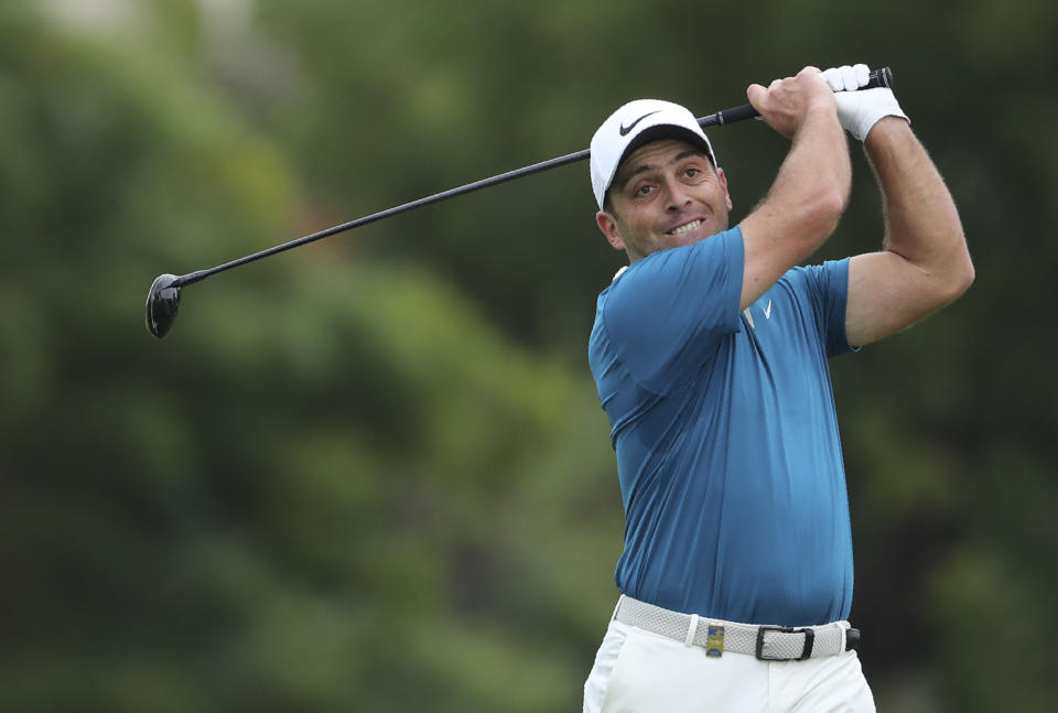 Francesco Molinari of Italy plays a shot on the 2nd hole during the first round of the DP World Tour Championship golf tournament in Dubai, United Arab Emirates, Thursday, Nov. 21, 2019. (AP Photo/Kamran Jebreili)