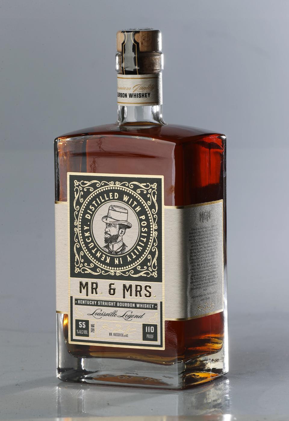 Former U of L basketball standout Russ Smith is promoting a line of bourbon whiskey called Mr. and Mrs. in Louisville, Ky. on Jan. 19, 2022.  This is the “Louisville Legend” version.