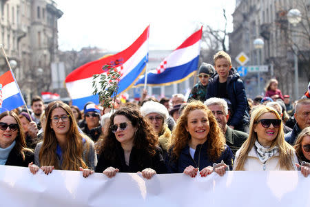 People are seen during the protest against the ratification of the Istanbul Convention in Zagreb, Croatia, March 24, 2018. REUTERS/Antonio Bronic