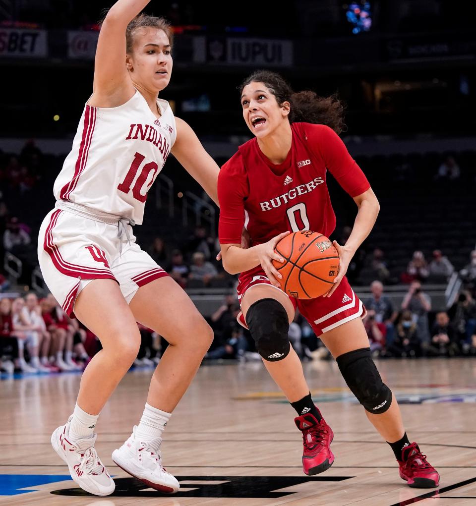 Rutgers Scarlet Knights guard Lasha Petree (0) rushes past Indiana Hoosiers forward Aleksa Gulbe (10) on Thursday, March. 3, 2022, at Gainbridge Fieldhouse in Indianapolis. Indiana Hoosiers defeated the Rutgers Scarlet Knights, 66-54.