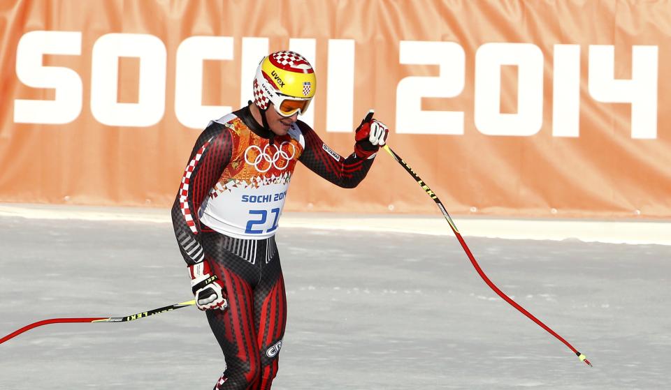 Croatia's Ivica Kostelic reacts in the finish area after competing in the downhill run of the men's alpine skiing super combined event during the 2014 Sochi Winter Olympics at the Rosa Khutor Alpine Center in Rosa Khutor February 14, 2014. REUTERS/Leonhard Foeger