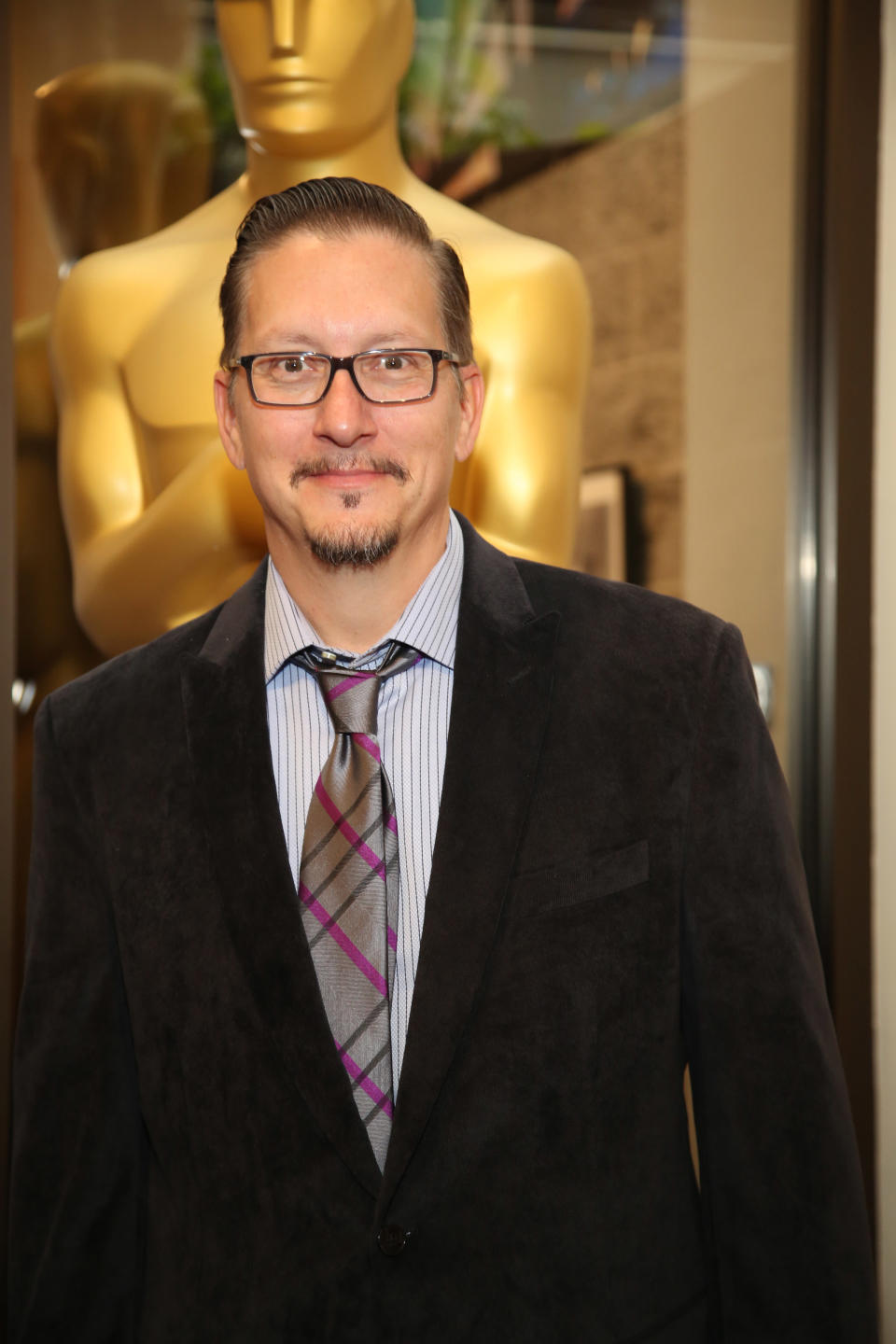 Stephen Prouty, who is nominated for an Academy Award for Best Makeup and Hairstyling for "Jackass Presents: Bad Grandpa," attends the 86th Annual Academy Awards: Makeup and Hairstyling reception on Saturday, March 1, 2014, in Beverly Hills, Calif. (Photo by Annie I. Bang /Invision/AP)