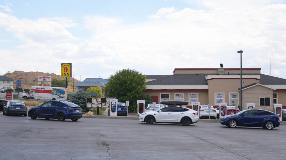 Tesla owners wait in line for an available charger in Utah.