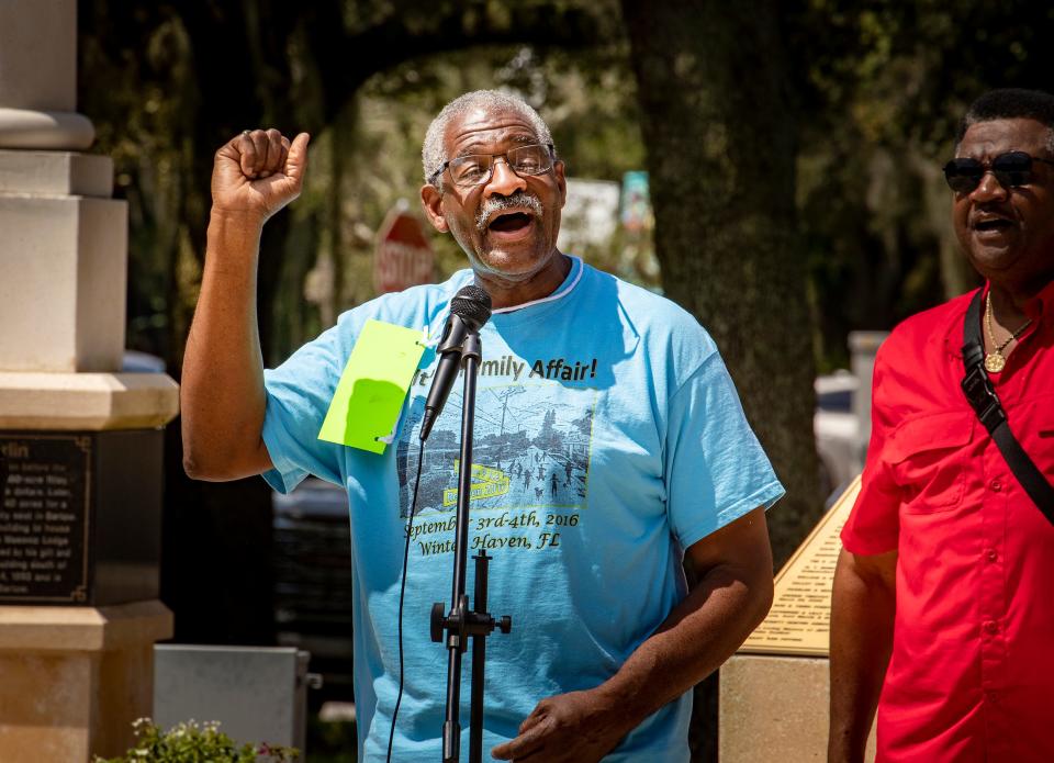 Robert Frazier of First Missionary Baptist Church in Winter Haven leads the group in song Tuesday at a news conference organized by the Polk Ecumenical Action Council for Empowerment. Frazier sang the hymn “Woke Up This Morning (With My Mind Stayed on Jesus),” substituting the word “justice."