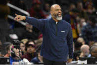 Washington Wizards head coach Wes Unseld Jr. points during the first half of an NBA basketball game against the Cleveland Cavaliers, Monday, Feb. 6, 2023, in Washington. (AP Photo/Nick Wass)