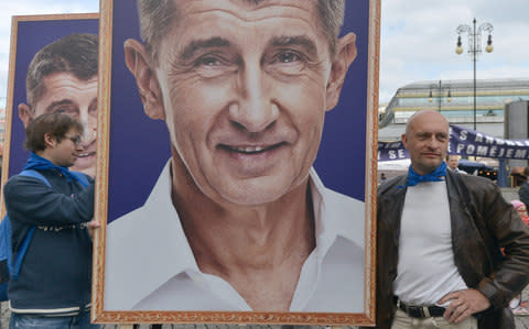 Protestors take part in a satirical demonstration against Andrej Babis in Prague. - Credit: Michal Cizek/AFP