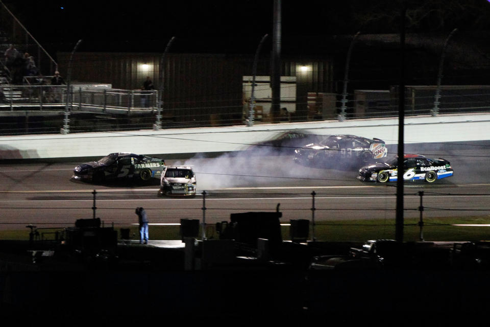 DAYTONA BEACH, FL - FEBRUARY 27: Ryan Newman, driver of the #39 U.S. Army/Quicken Loans Chevrolet, spins on the backstretch after being involved in an on track incident during the NASCAR Sprint Cup Series Daytona 500 at Daytona International Speedway on February 27, 2012 in Daytona Beach, Florida. (Photo by Tom Pennington/Getty Images for NASCAR)