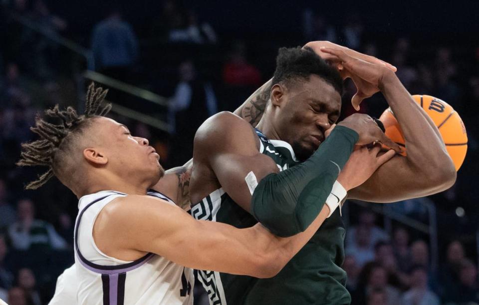 Kansas State’s Keyontae Johnson battles Michigan State’s Mady Sissoko for a rebound during the first half of their east region semifinal game at Madison Square Garden on Thursday night.