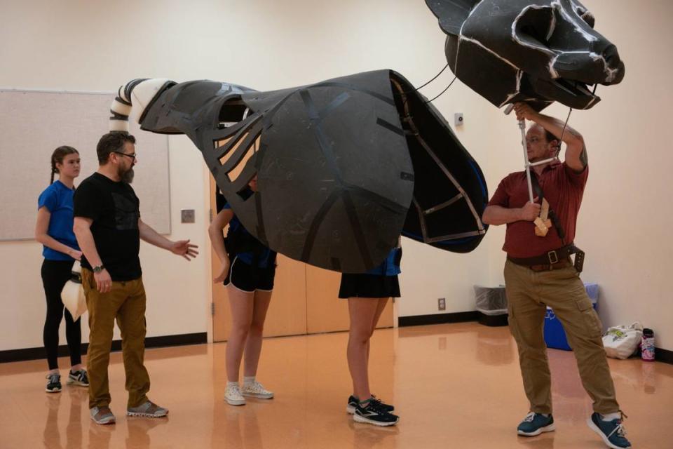 For the Children’s Theatre of Charlotte’s production of “Narnia the Musical,” Aslan, played by Tommy Foster, joins rehearsal with the rest of the puppeteers for puppet training led by Steven Levine.