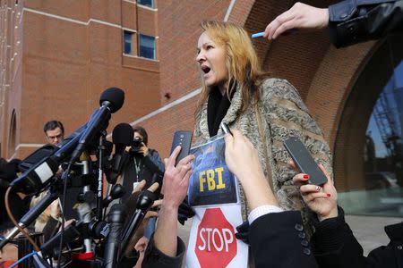 Elena Teyer, mother-in-law of Ibragim Todashev, speaks to reporters following a pre-trial conference for Boston Marathon bombing suspect Dzhokhar Tsarnaev at the federal courthouse in Boston, Massachusetts December 18, 2014. REUTERS/Brian Snyder