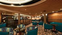 <p>The Silver Cloud’s bar room features complimentary cocktails, live music and a dance floor. (silversea.com) </p>