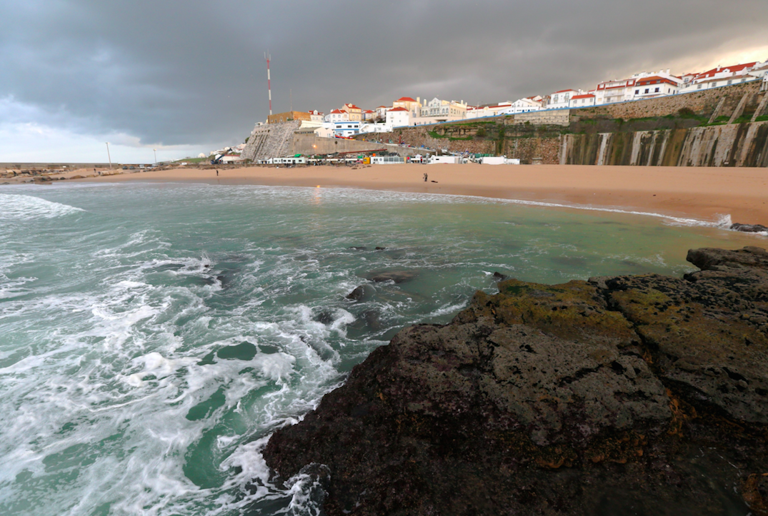 The couple fell 30m from a wall at Pescadores beach in Portugal (Picture: Rex)