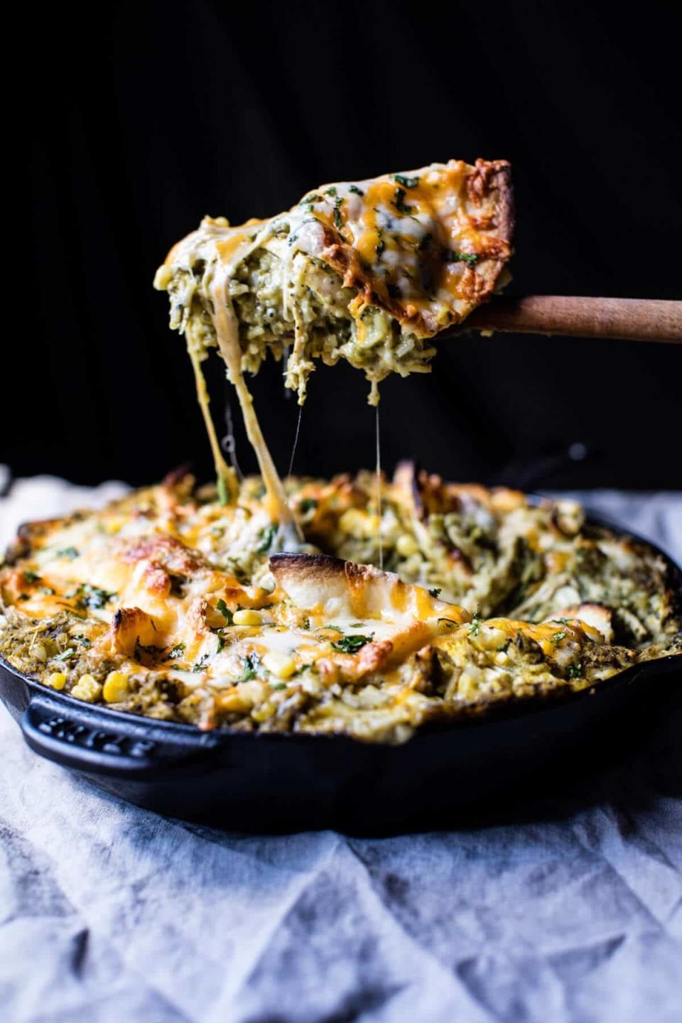 <strong>Get the <a href="https://www.halfbakedharvest.com/skillet-salsa-verde-chicken-tortilla-rice-bake/" target="_blank">Skillet Salsa Verde Chicken Tortilla Rice Bake</a>&nbsp;recipe from Half Baked Harvest</strong>