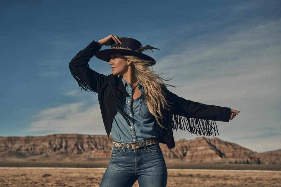 Lainey Wilson’s bohemian-meets-rockstar style is on display in Wrangler’s new Fall/Winter 2023 campaign.