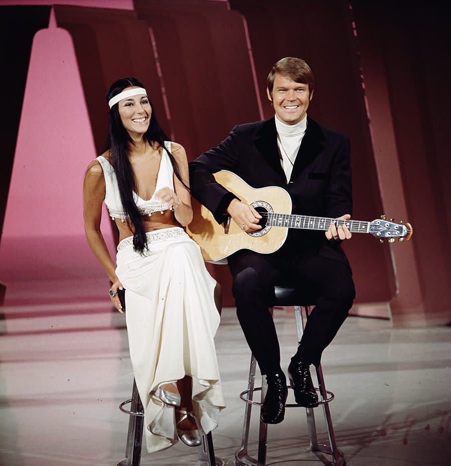 Cher performs with Glen Campbell on “The Glen Campbell Goodtime Hour” in 1969.