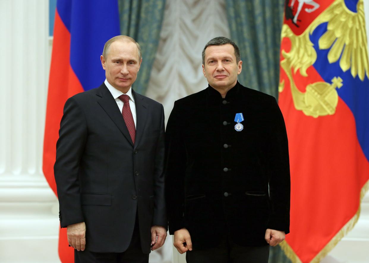 Russian television and radio host Vladimir Solovyov (r), pictured with <span class="caas-xray-inline-tooltip"><span class="caas-xray-inline caas-xray-entity caas-xray-pill rapid-nonanchor-lt" data-entity-id="Vladimir_Putin" data-ylk="cid:Vladimir_Putin;pos:1;elmt:wiki;sec:pill-inline-entity;elm:pill-inline-text;itc:1;cat:OfficeHolder;" tabindex="0" aria-haspopup="dialog"><a href="https://search.yahoo.com/search?p=Vladimir%20Putin" data-i13n="cid:Vladimir_Putin;pos:1;elmt:wiki;sec:pill-inline-entity;elm:pill-inline-text;itc:1;cat:OfficeHolder;" tabindex="-1" data-ylk="slk:Vladimir Putin;cid:Vladimir_Putin;pos:1;elmt:wiki;sec:pill-inline-entity;elm:pill-inline-text;itc:1;cat:OfficeHolder;" class="link ">Vladimir Putin</a></span></span>, hit out at Germany's decision to send tanks to Ukraine. (AP)