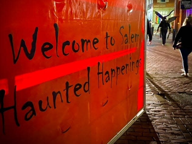 Haunted Happenings banner as you walk into the heart of downtown