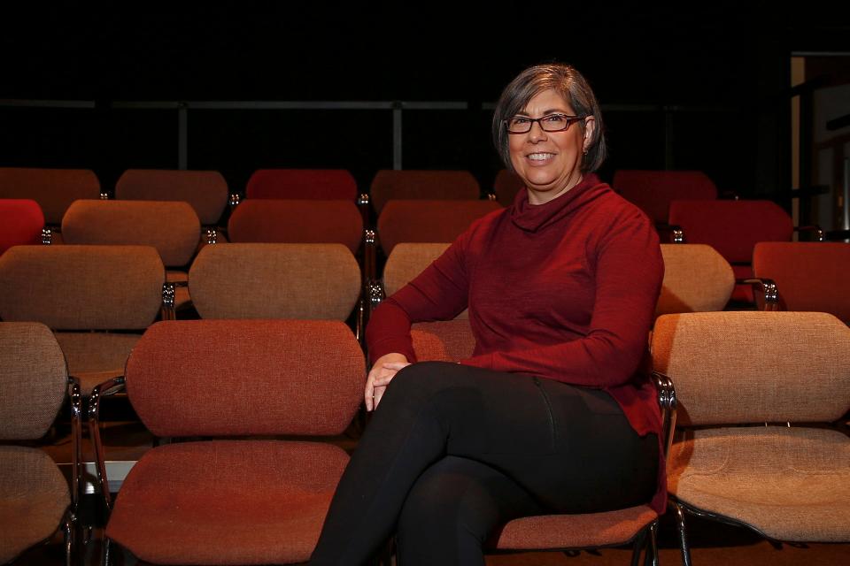 Playwright Karen Schaeffer poses for a photo at Stoner Theater at the Des Moines Civic Center in Des Moines on Wednesday, Nov. 24, 2021.