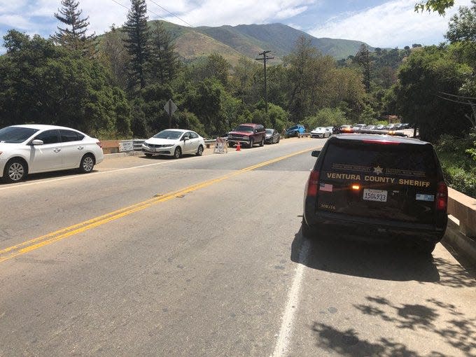 Highway 150 was closed briefly Tuesday morning after a crash between a van and a motorcycle.