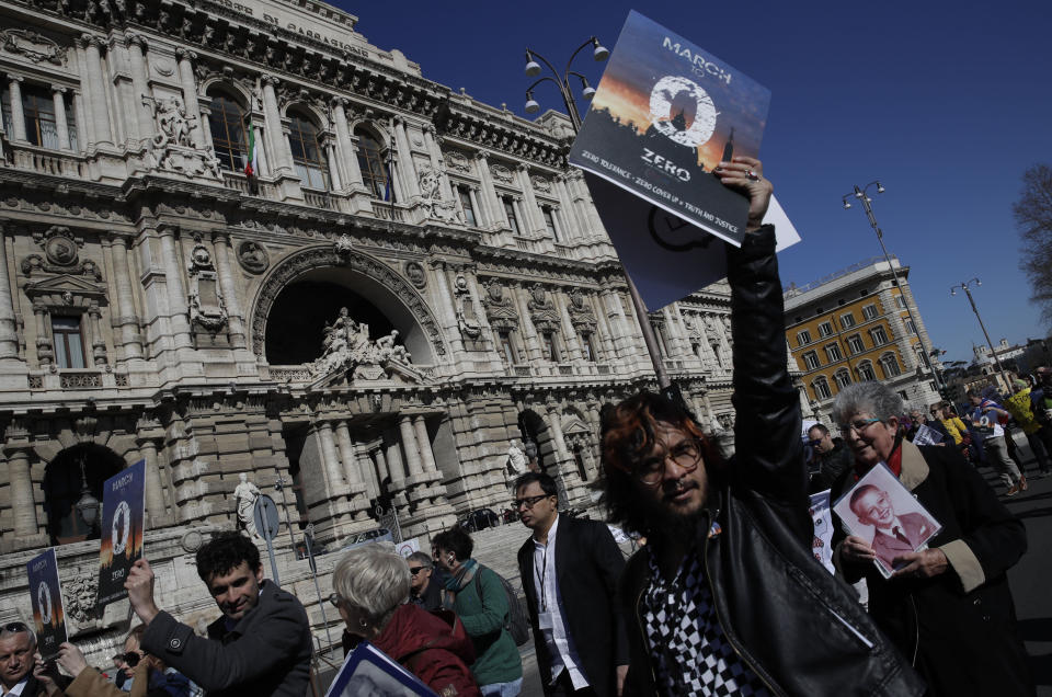 Sex abuse survivors and members of the ECA (Ending Clergy Abuse), march in downtown Rome, Saturday, Feb. 23, 2019. Pope Francis is hosting a four-day summit on preventing clergy sexual abuse, a high-stakes meeting designed to impress on Catholic bishops around the world that the problem is global and that there are consequences if they cover it up. (AP Photo/Alessandra Tarantino)